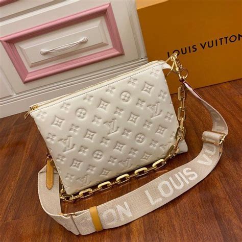 louis vuitton coussin pm cream|More.